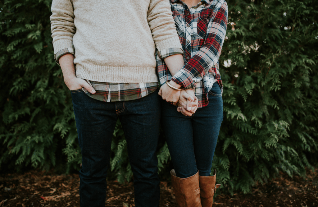 Couple holding hands