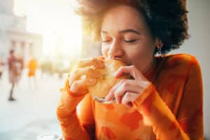 Woman eating burger