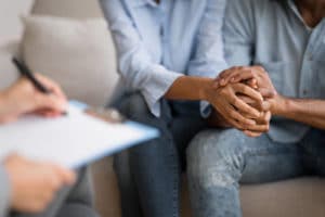 Image of a man & woman holding hands during a Edmonton couples counselling session. There are lots of reasons that people start couples therapy in Sherwood Park, AB. Including these warning signs. Talk with a couples therapist in Sherwood Park, AB at Onyx to see how we can help you. Reach out now!