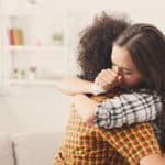 Girl teen comforted by therapist