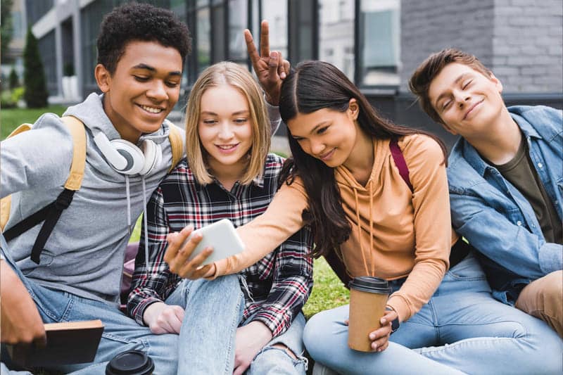 teens taking selfie